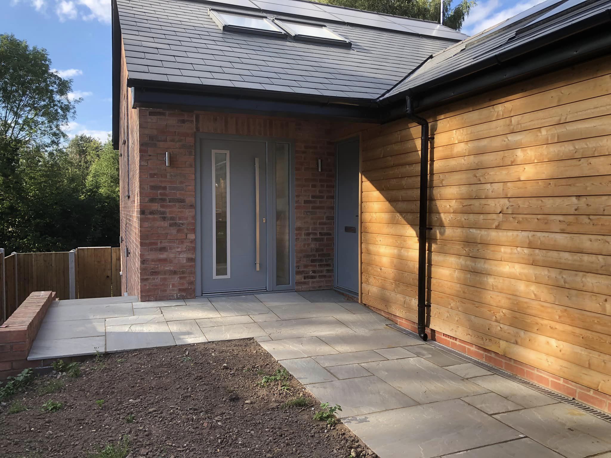 Two storey new build on split level site