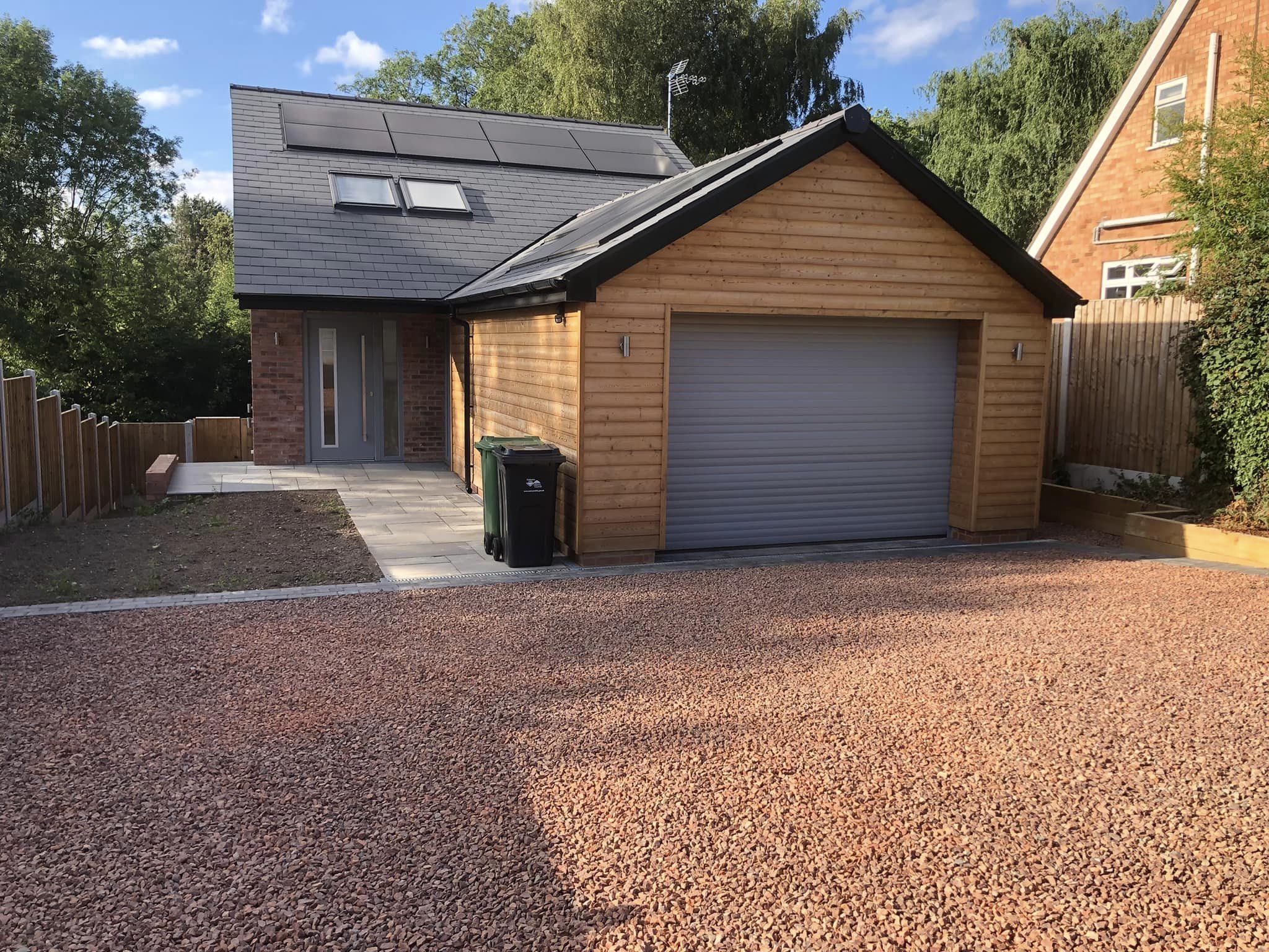 Two storey new build on split level site