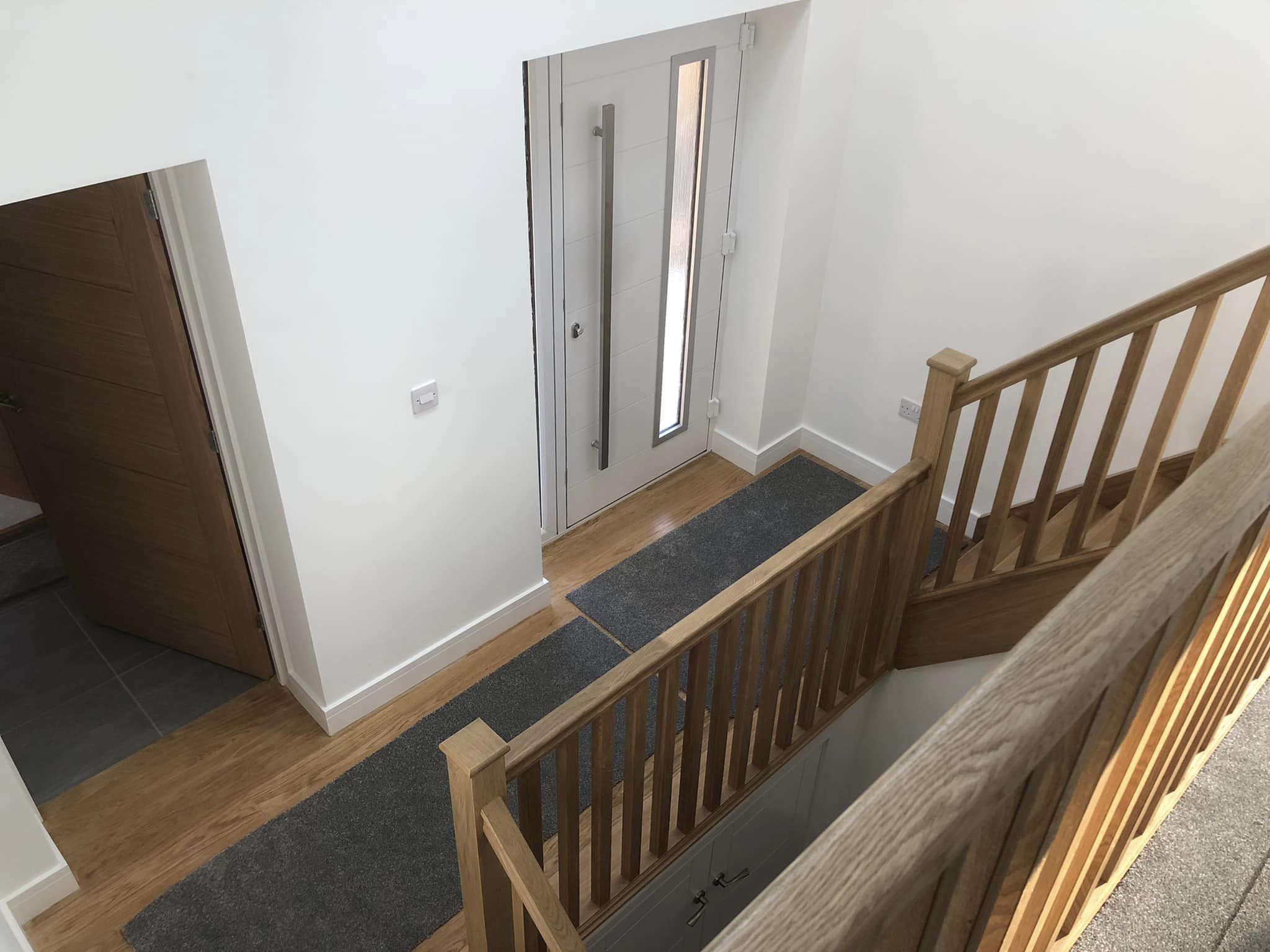 Two storey new build on split level site