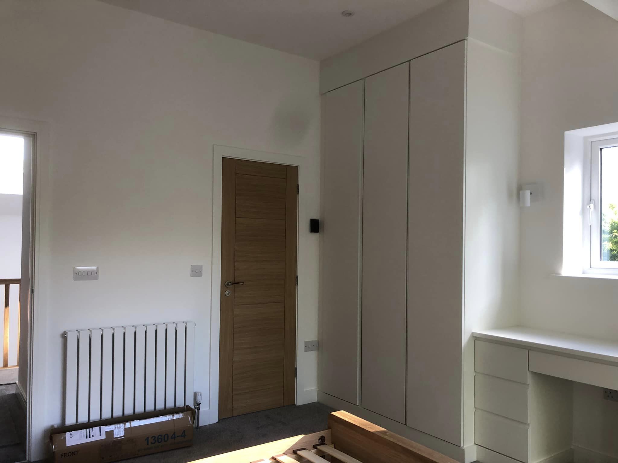 Two storey new build on split level site