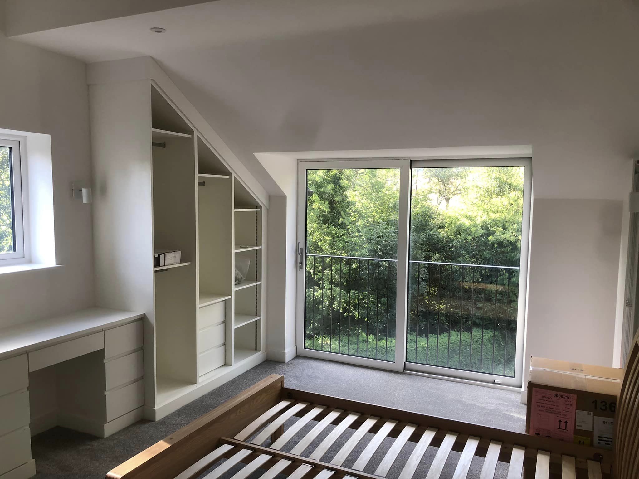 Two storey new build on split level site